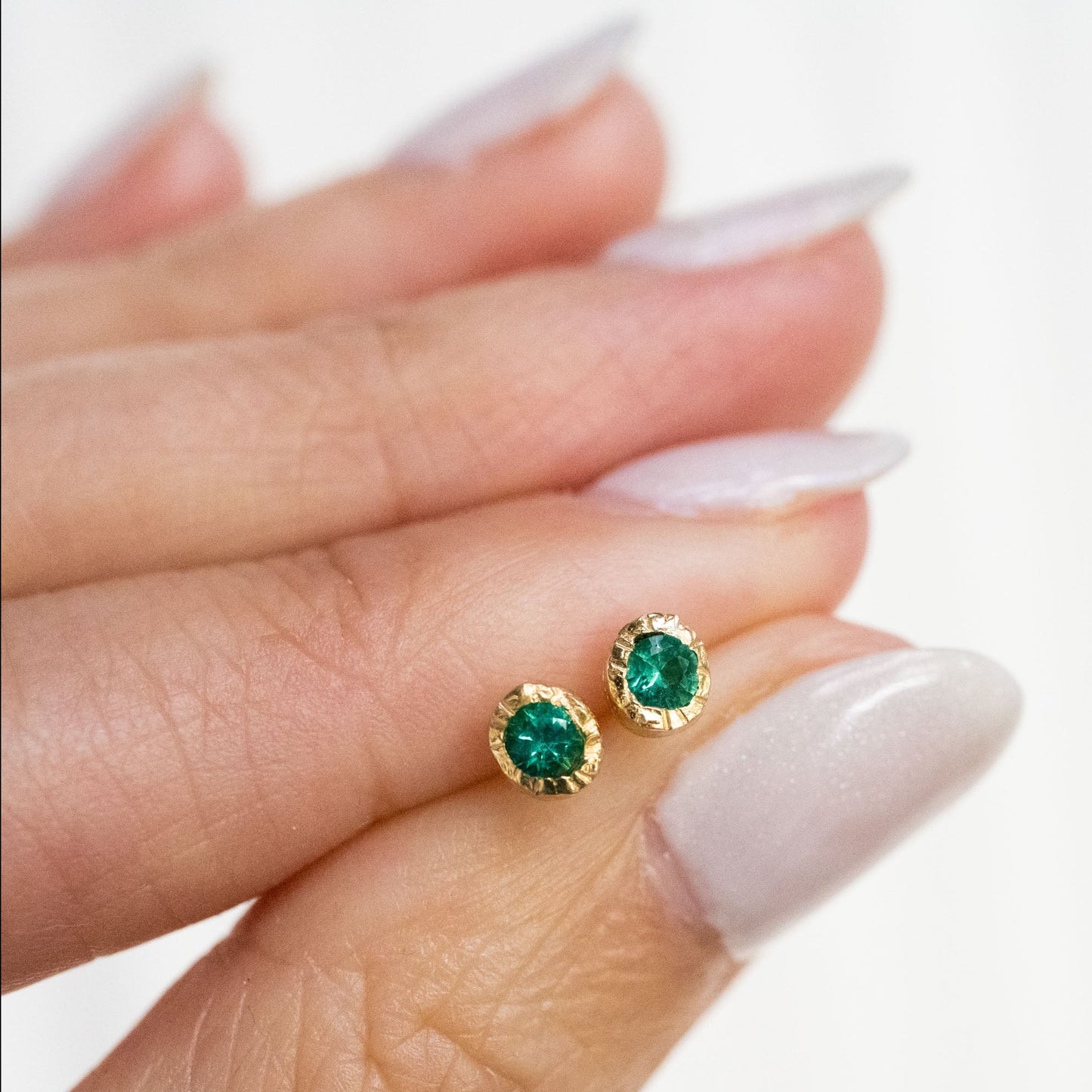 Emerald Spark Studs