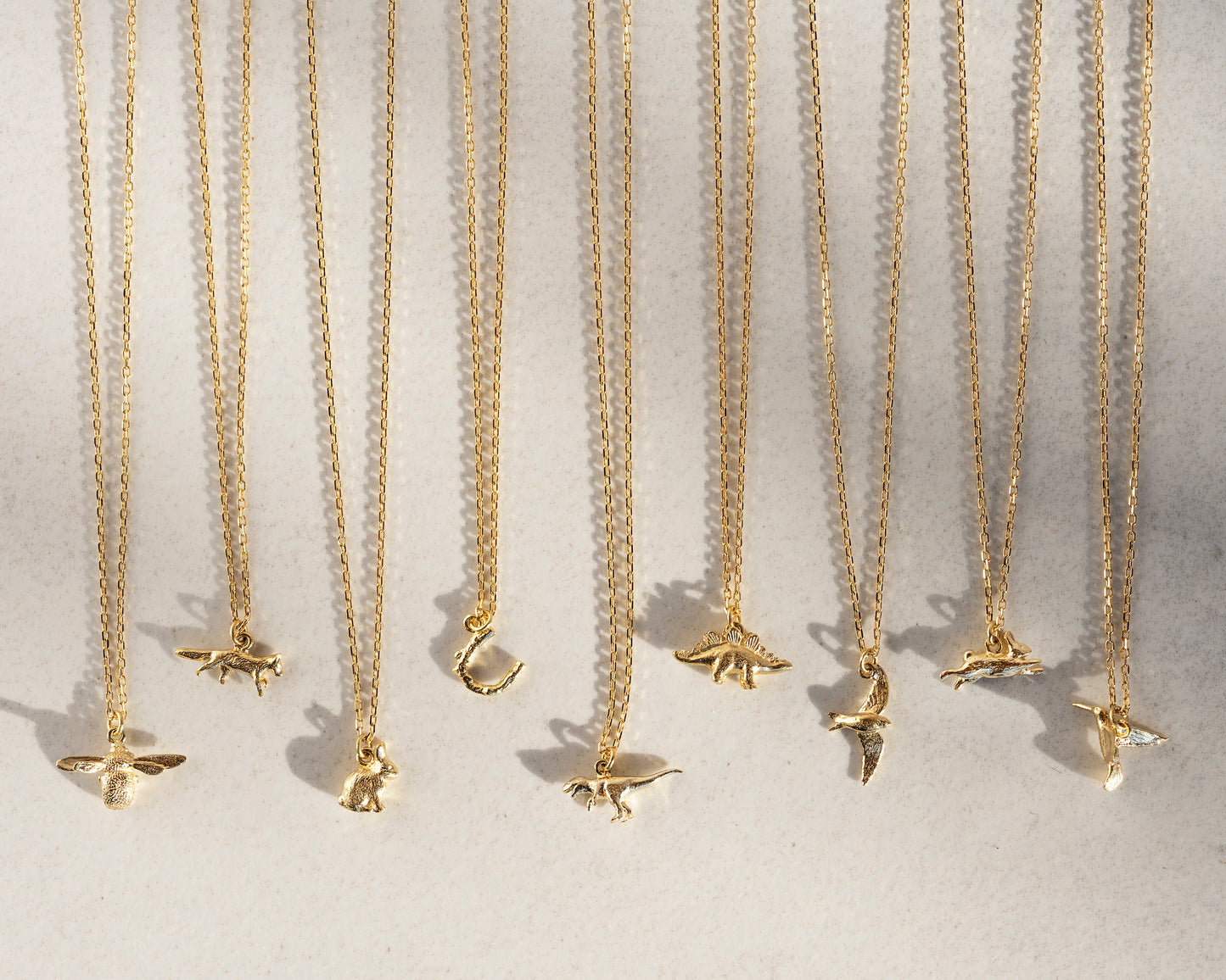 Teeny Tiny Stegosaurus Necklace