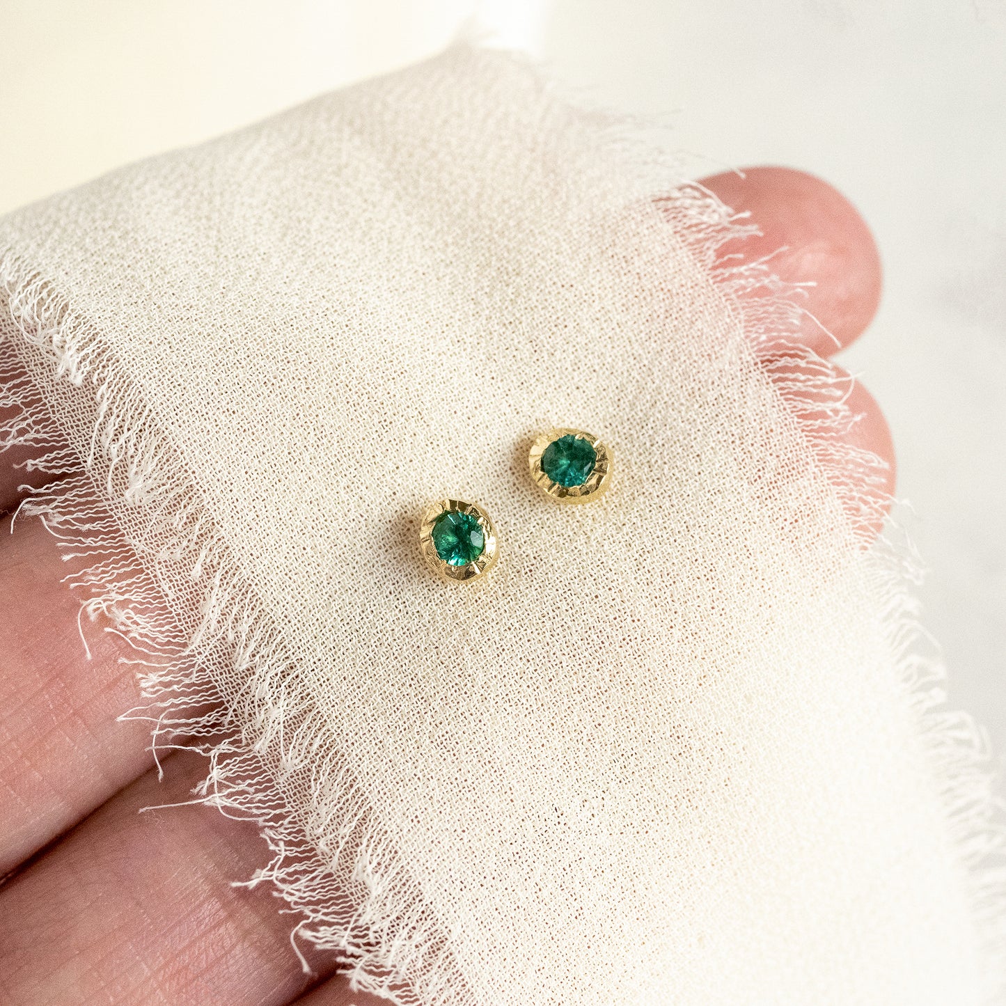 Emerald Spark Studs